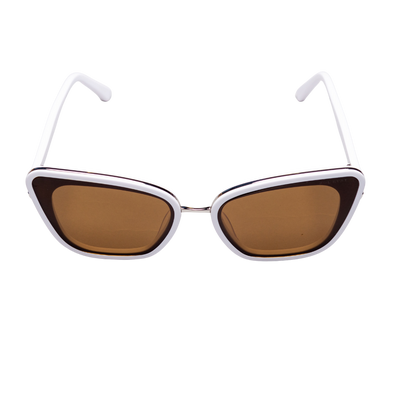 Top angle view of Sol Kyst women's cat eye sunglasses with white frames and brown tinted lenses.